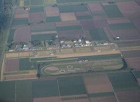 Normal_lelystad_airport__via_wiki___an_aerial_picture_of_lelystad_airport_and_aviodrome_taken_from_estonian_airways_flight_ov_0473__