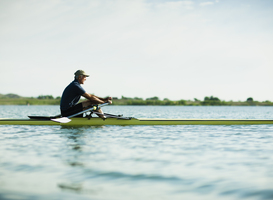 Normal_a-middle-aged-man-in-a-rowing-boat-on-the-water-2022-03-04-02-29-42-utc