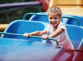 Normal_happy-female-kid-have-fun-on-a-roller-coaster-in-t-2021-08-30-08-04-56-utc-min__1_