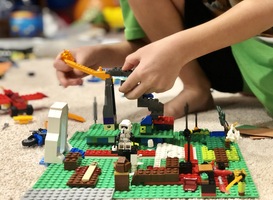 Normal_boy-playing-and-building-with-lego-toys-2022-11-15-12-43-19-utc