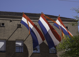 Normal_three-times-a-dutch-flag-in-red-white-blue-with-an-2023-03-22-04-37-57-utc