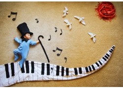 Logo_baby-piano-player-600x420-300x210